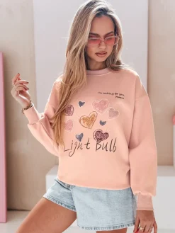 Bluzy Damskie>Dstreet Bluza damska oversize z sercami PINKNOTE różowa BY1500